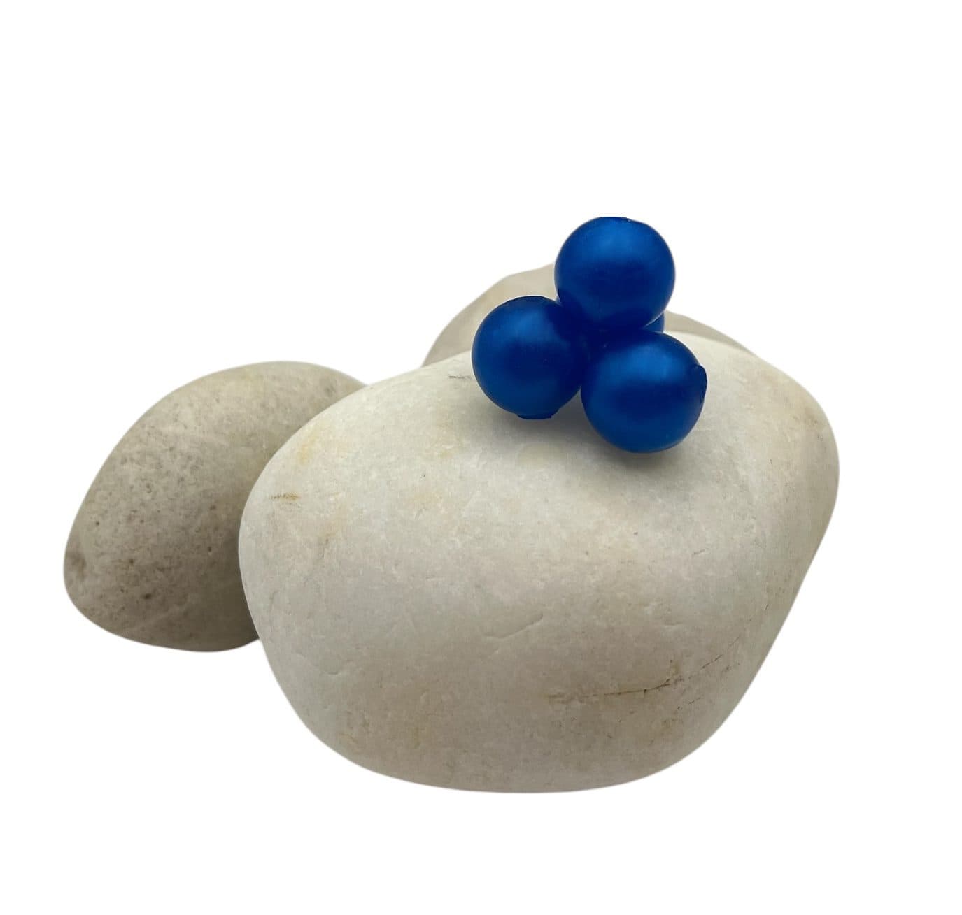 Blue Pearl Soft Beads on white rock