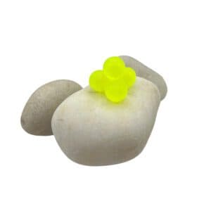 Chartreuse soft bead on white rock