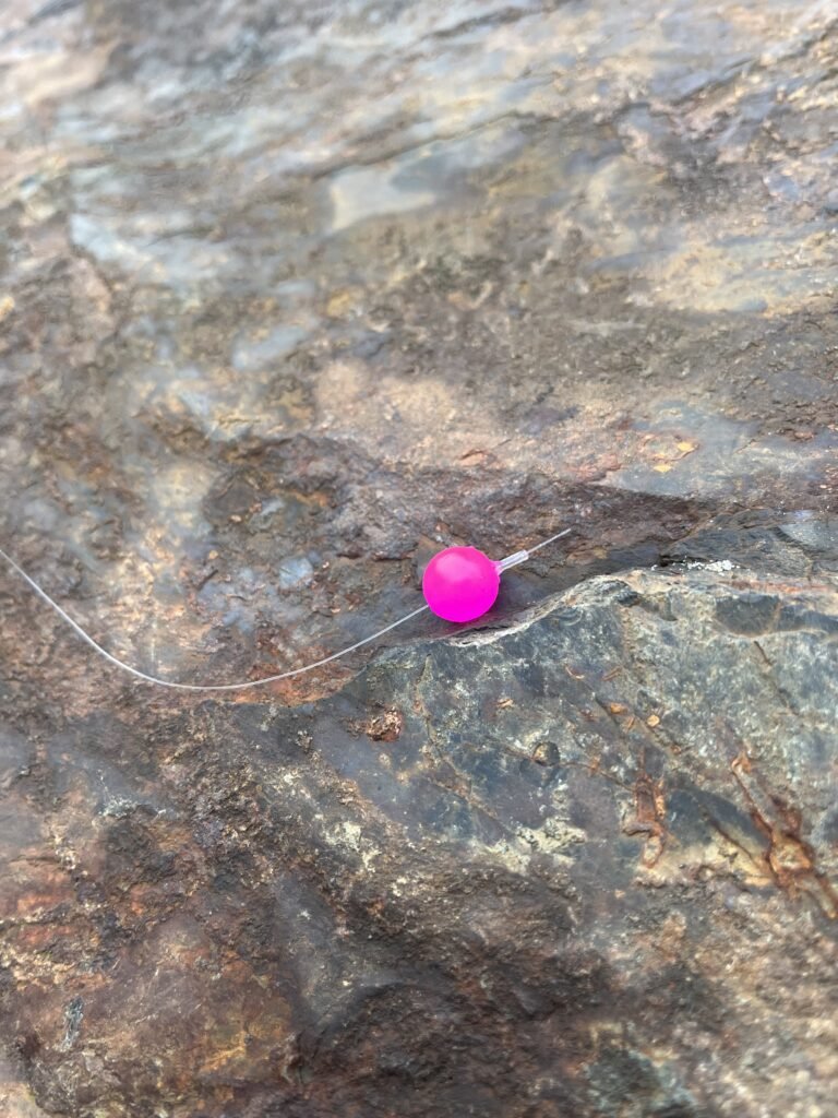 soft bead placement on leader Hot Pink Soft Bead on rock
